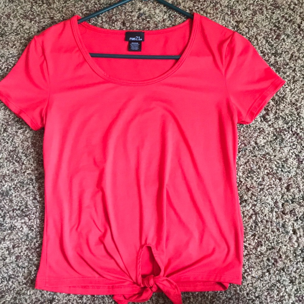Rue 21 shirt. It has a tie at the bottom of it.